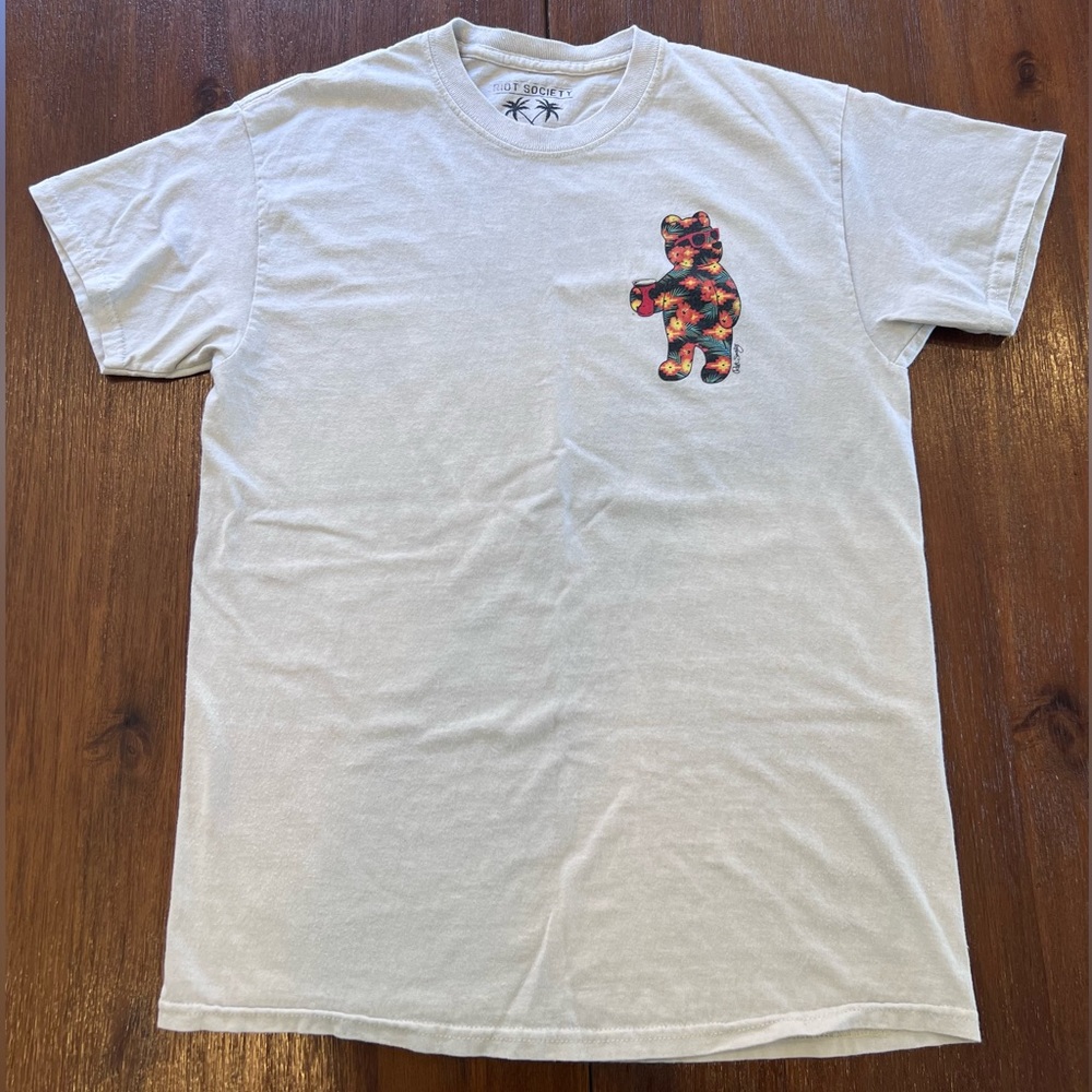 Size medium white Riot Society t shirt with bear logo.